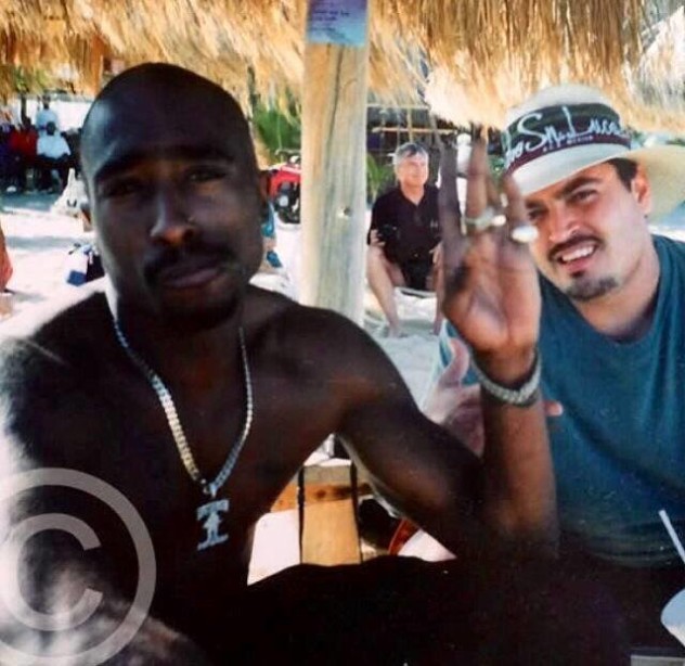 tupac alive 1000 haitians